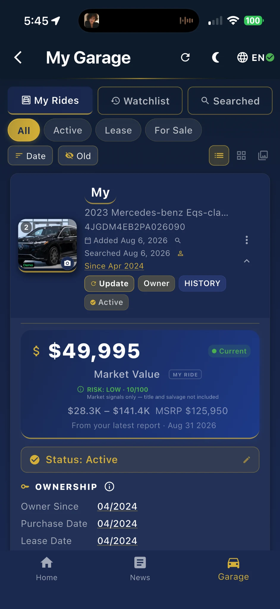Actual My Garage screen with saved vehicle information and market value